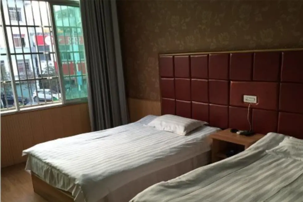 Цзюцзян: Junyi Business Inn