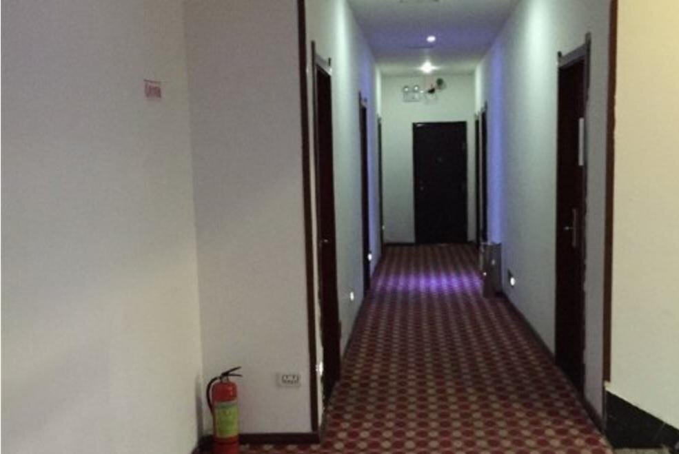 Цзюцзян: Junyi Business Inn
