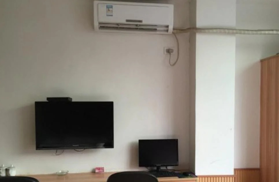 Цзюцзян: Junyi Business Inn