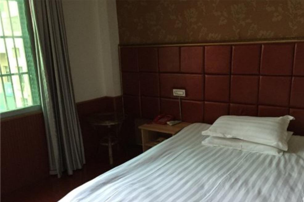 Цзюцзян: Junyi Business Inn