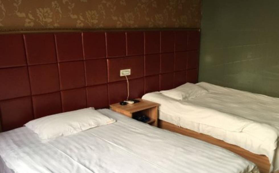 Цзюцзян: Junyi Business Inn