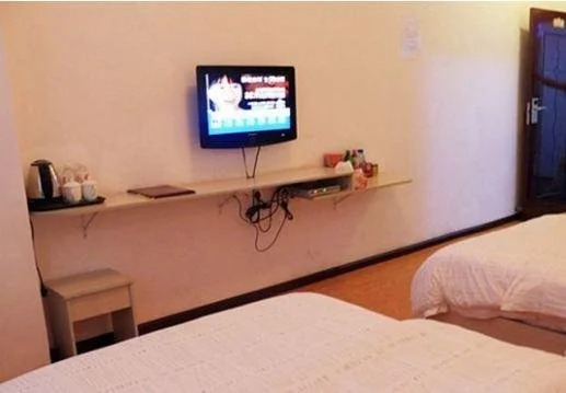 Синъи: Jiayue Inn