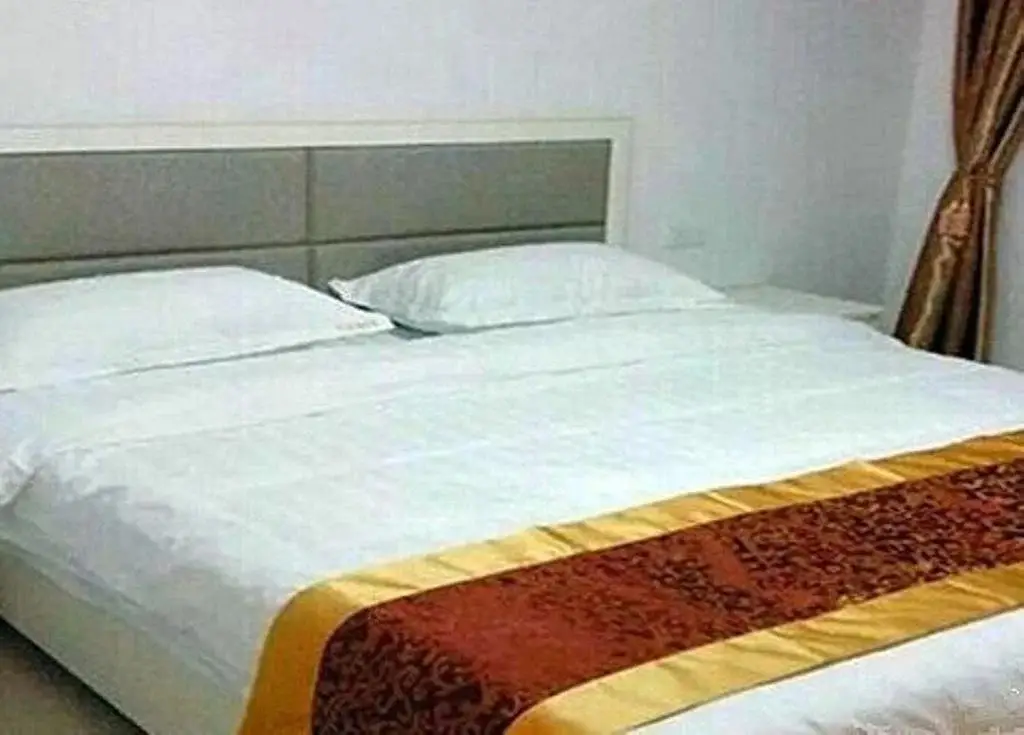 Лиаоченг: Jiahao Business Inn