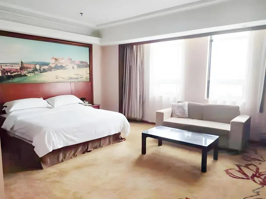 Уси: Vienna Hotel