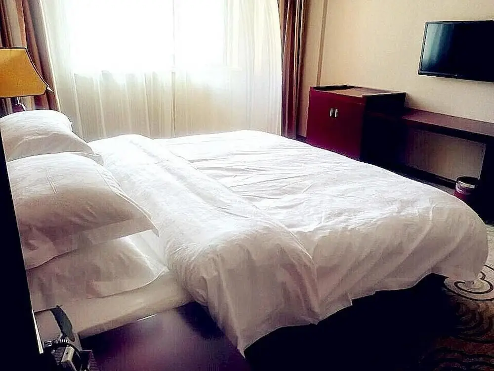 Mingjia Spring Holiday Hotel — фото 1