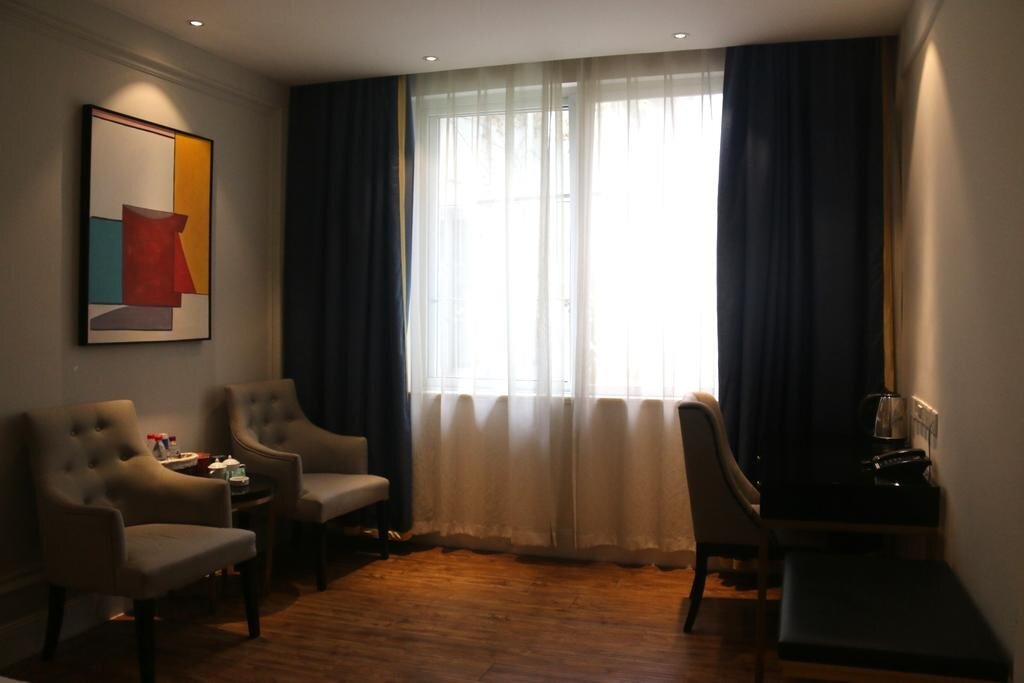 Яань: Ju Yuan Business Hotel