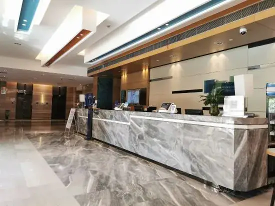Шанхай: New Jinqiao Holiday Apartment