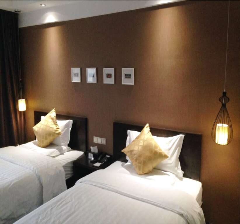 Куньмин: Badi Hotel E Home Inn Kunming South Asian Style Br