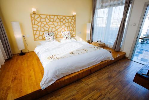 Дали: Dali Shiamu Inn