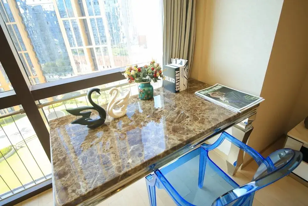 Циндао: Qingdao Lejiaxuan Yuexi Apartment Hongkong Central Rd The MIXC Branch