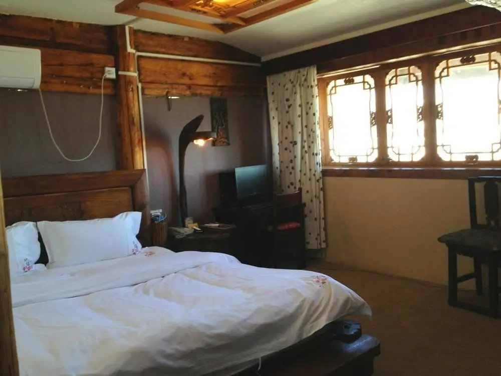Courier Inn Lijiang — фото 1