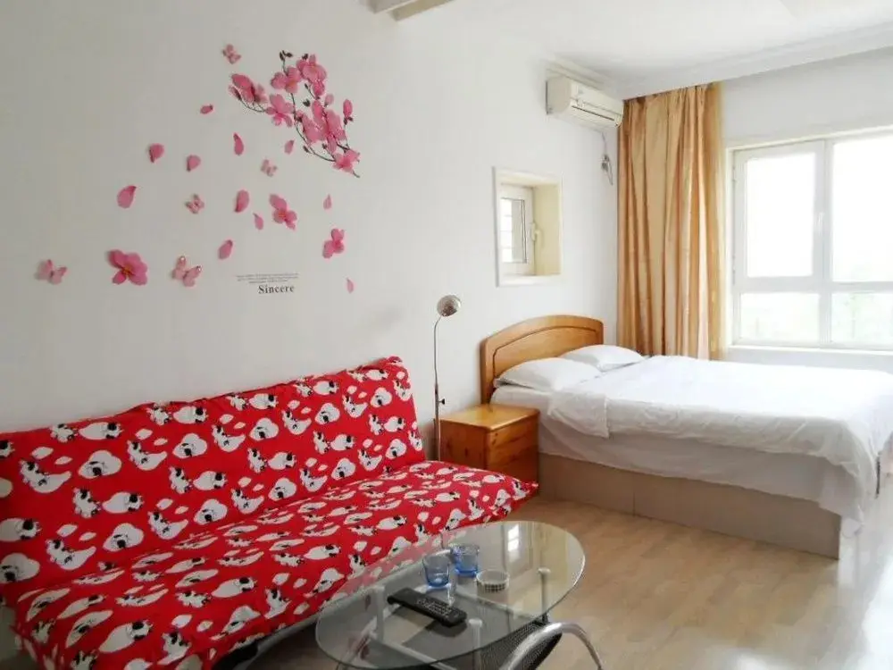 Далянь: Dalian Jiujiuyuan Hotel Apartment