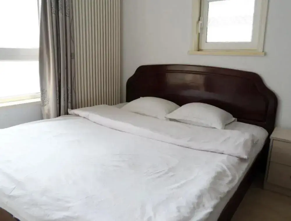 Далянь: Dalian Jiujiuyuan Hotel Apartment