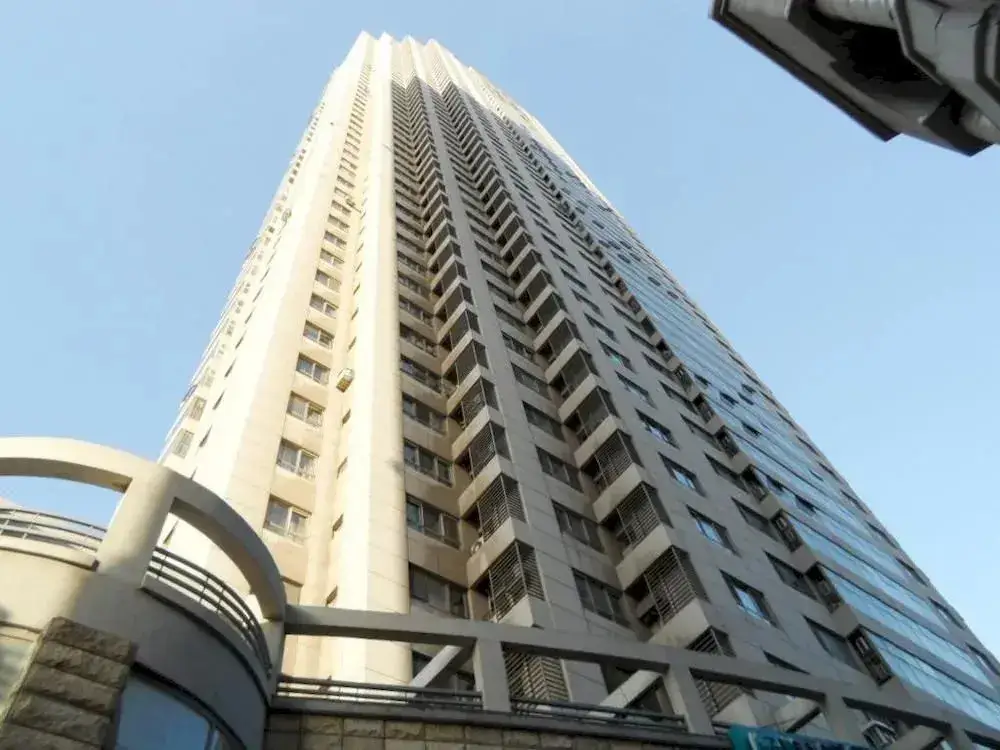 Далянь: Dalian Jiujiuyuan Hotel Apartment