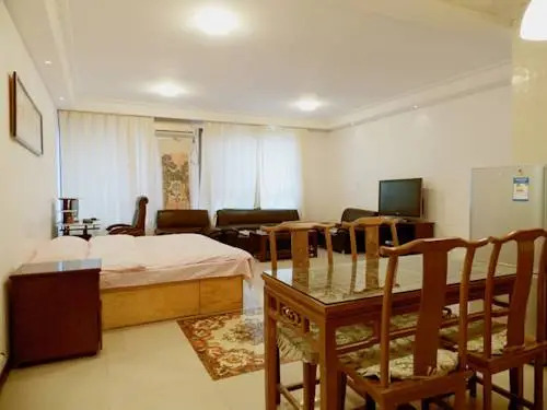 Далянь: Xinghai Zhilian Apartment