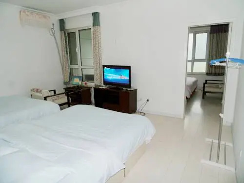 Далянь: Xinghai Zhilian Apartment