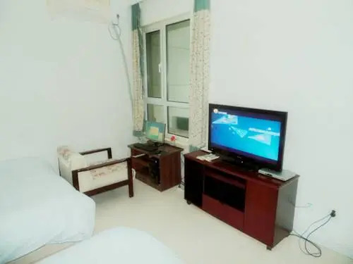 Далянь: Xinghai Zhilian Apartment