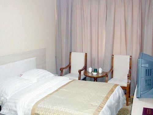 Циндао: Zhuhui Business Hotel - Qingdao