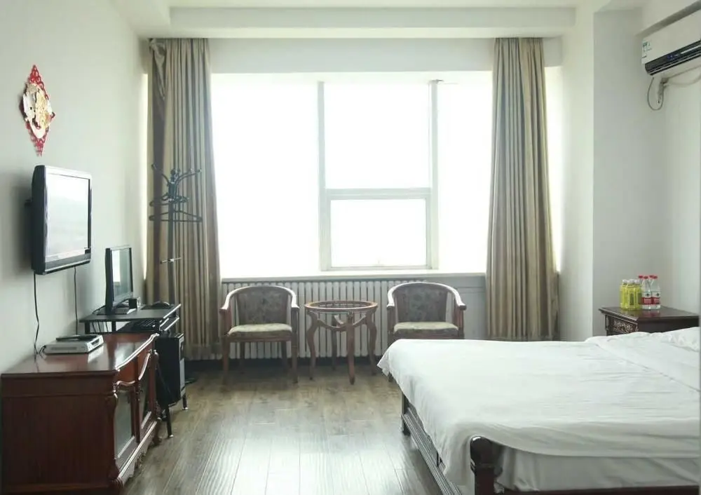 Далянь: Champs Elysees Jinfu Apartment