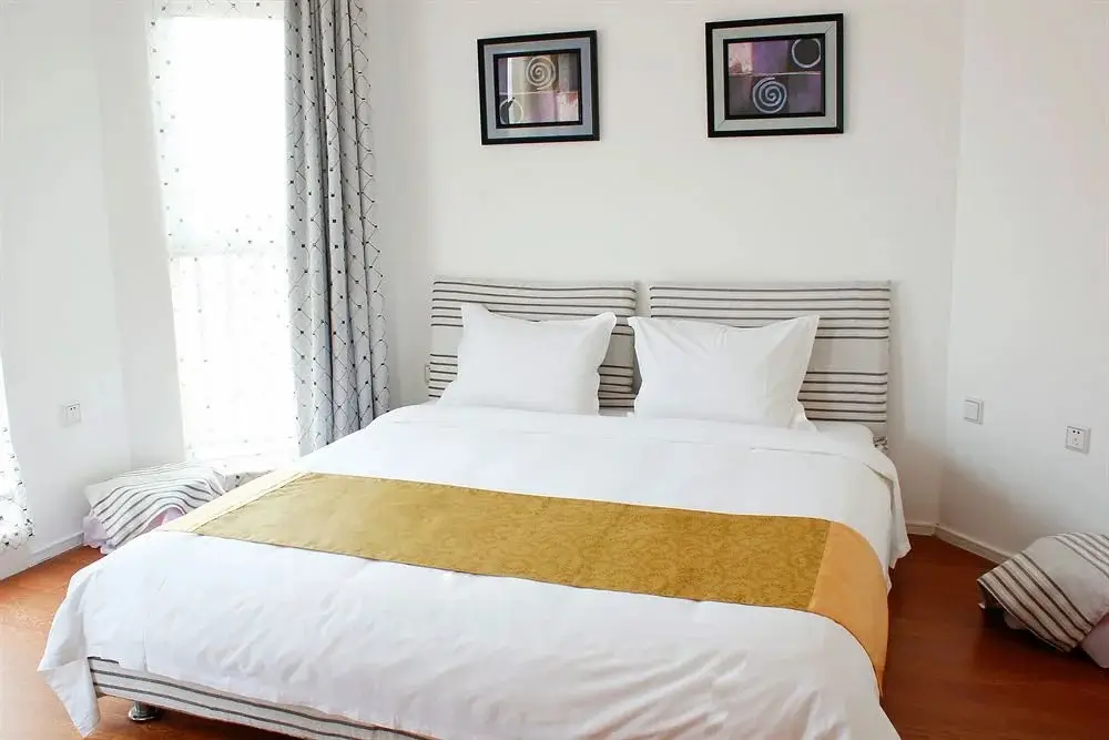 Циндао: Qingdao Tujia Sweetome Vacation Rentals Golden Beach