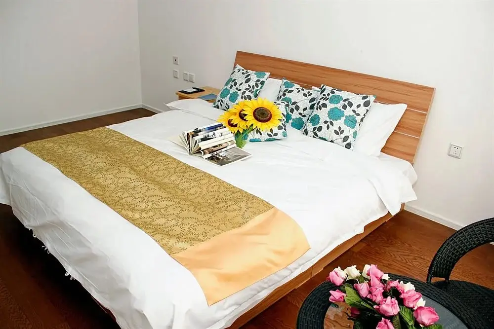 Циндао: Qingdao Tujia Sweetome Vacation Rentals Golden Beach