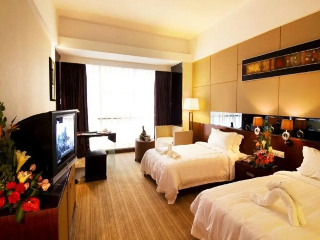 Hainan Wanlilong Business Hotel — фото 1