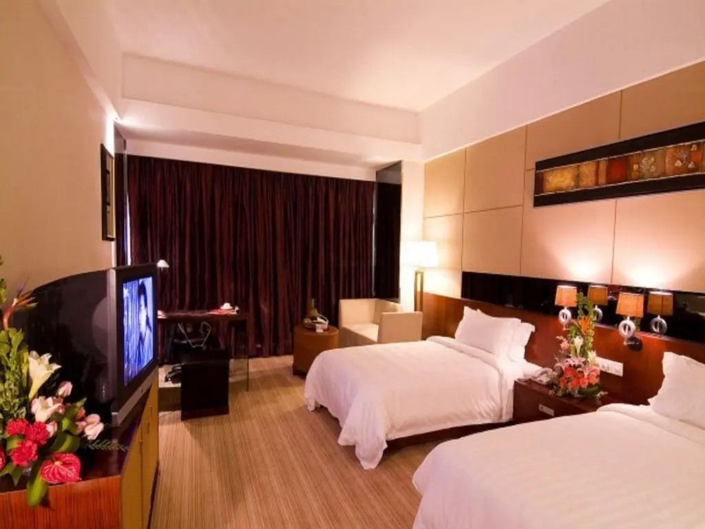 Хайкоу: Hainan Wanlilong Business Hotel