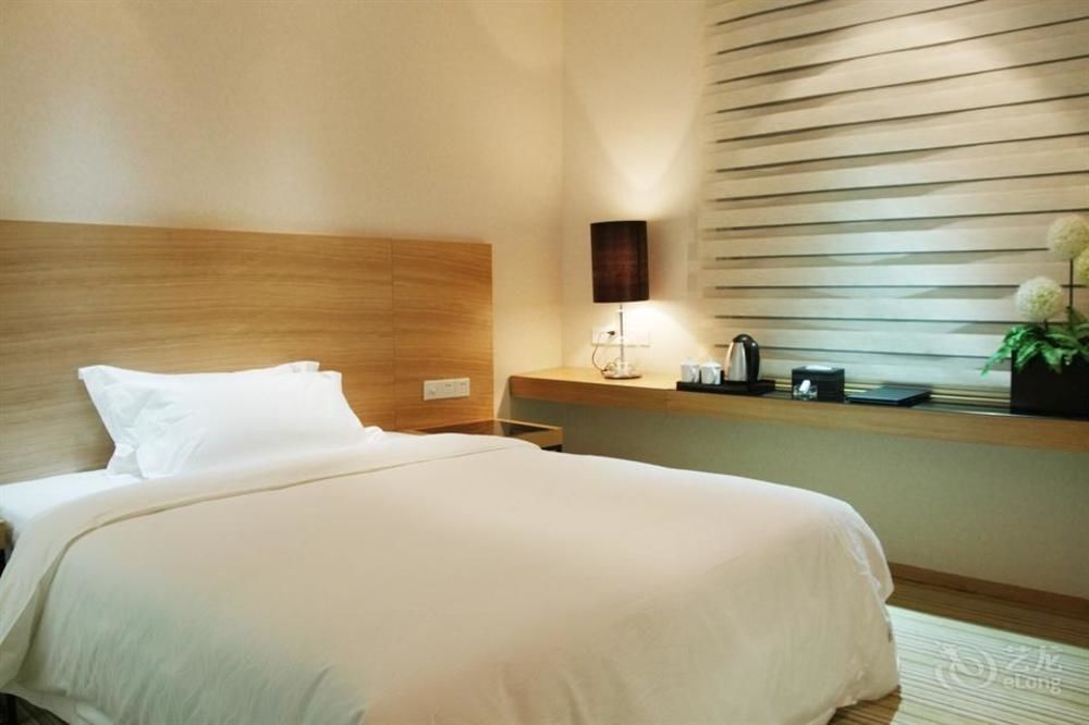 Ухань: Wuhan Yuntai 6 Plus 1 Hotel