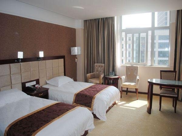 Jinglong Business Hotel — фото 1