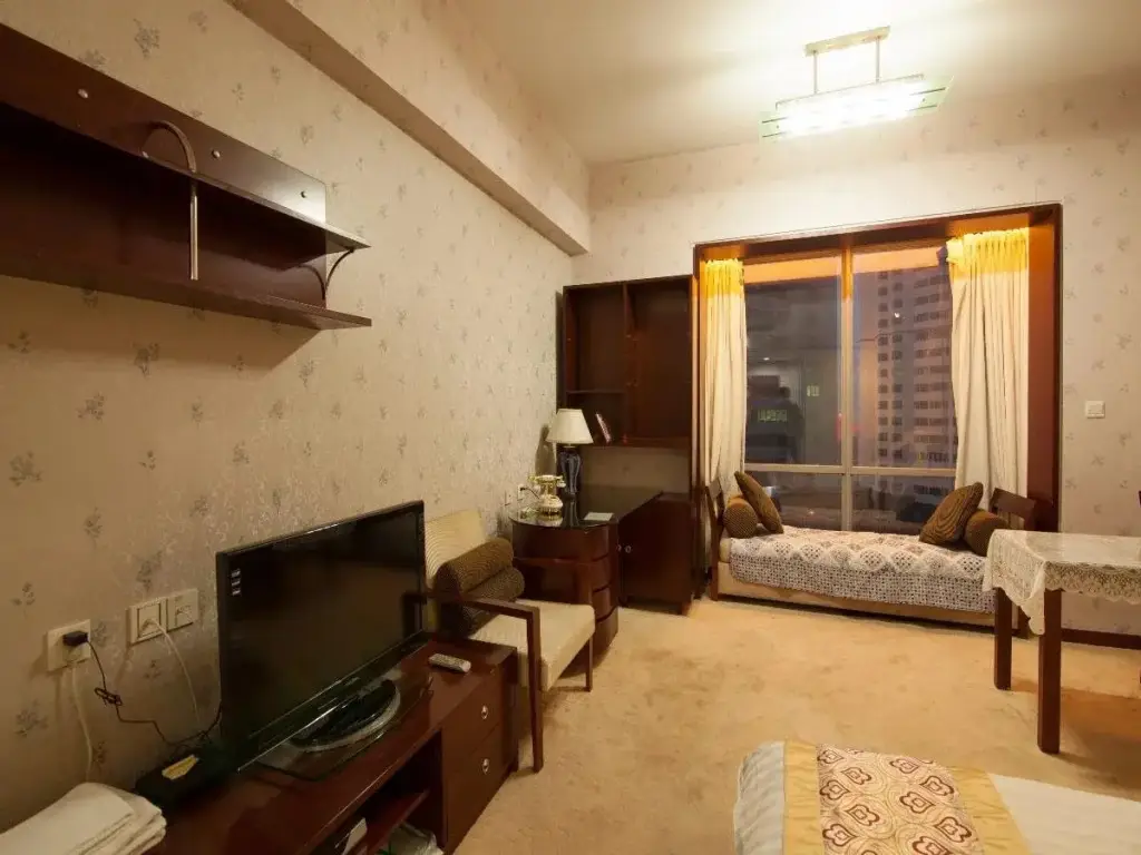 Циндао: 3rd-degree Seascape Apartment Hotel
