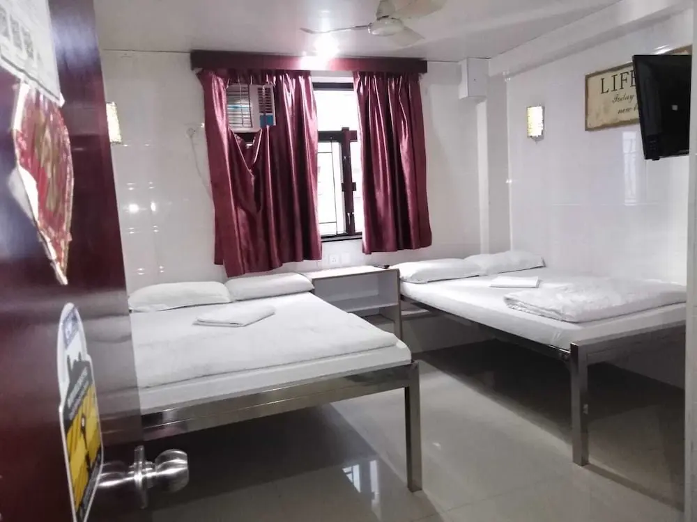 Гонконг: Kowloon TST Guest House