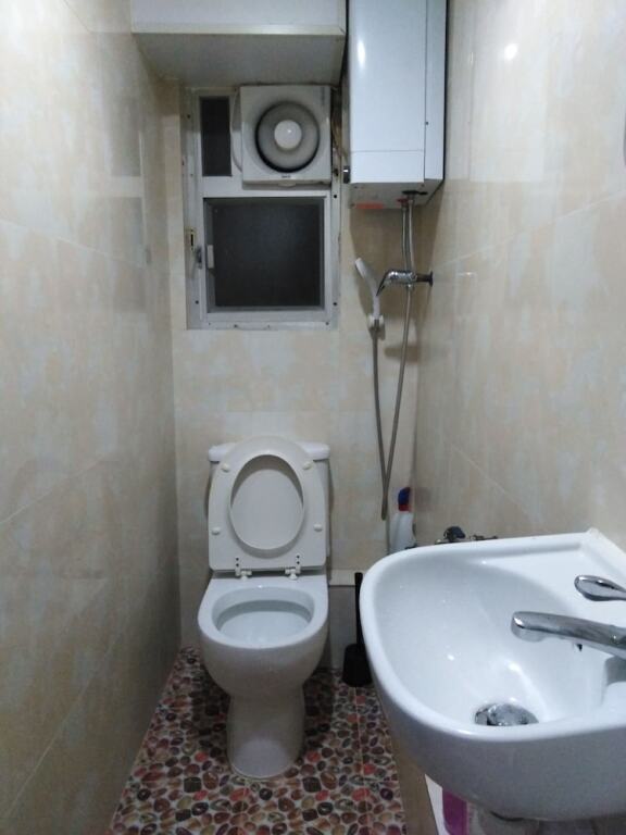 Гонконг: Kowloon TST Guest House