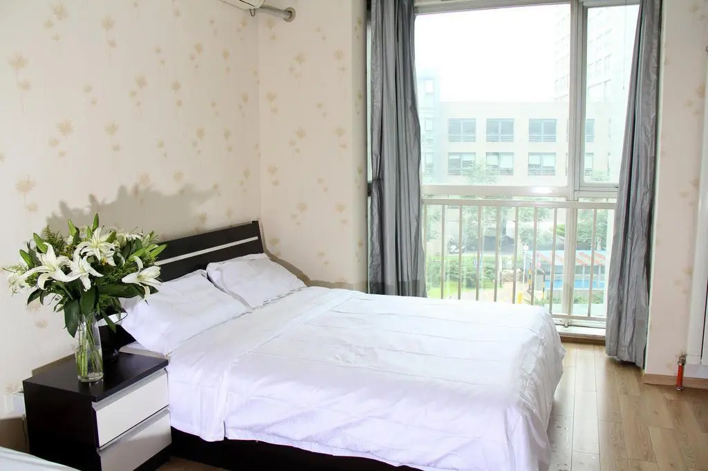 Пекин: Qianbaihui Apartment Zhongguancun