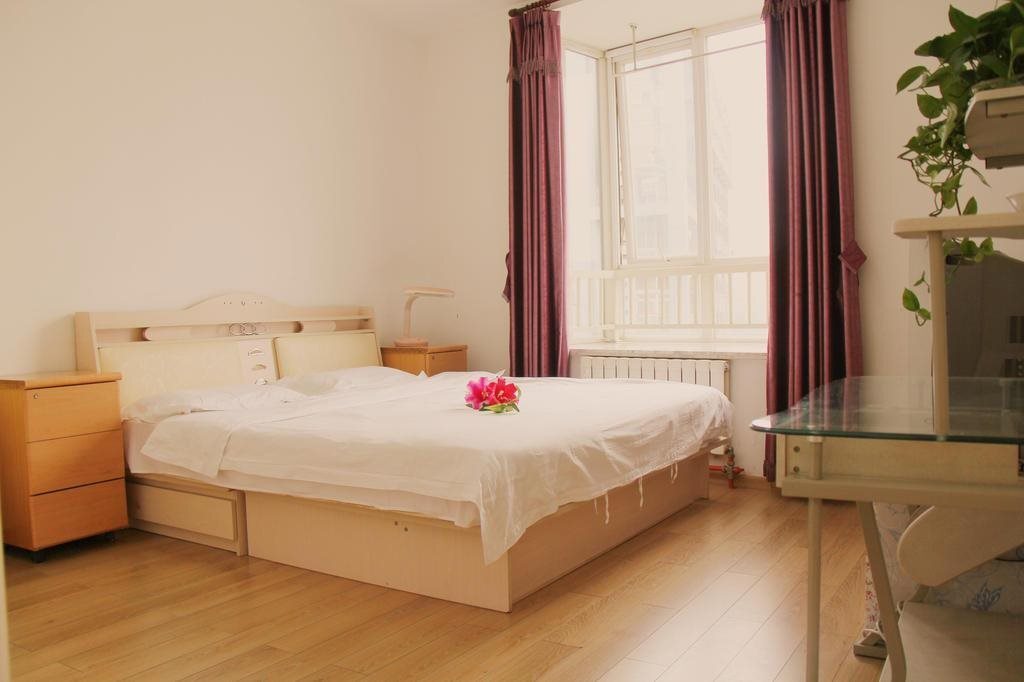 Пекин: Qianbaihui Apartment Zhongguancun
