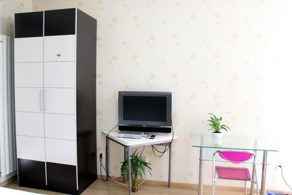 Пекин: Qianbaihui Apartment Zhongguancun