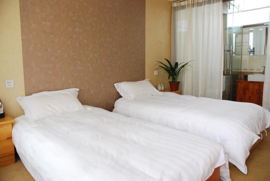 Лицзян: Li Jiang Ya Yue Hostel