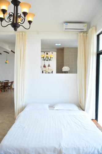 Санья: Fenghuang Rujia Holiday Apartments (Sanya Bay Branch)