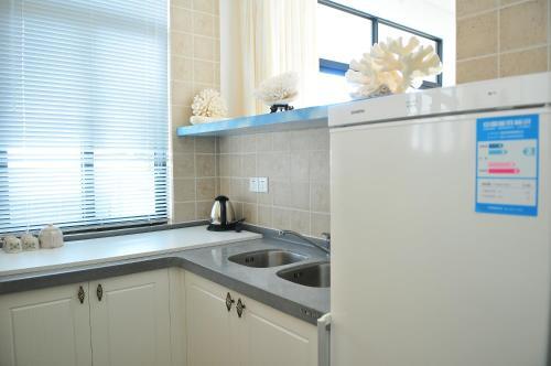 Санья: Fenghuang Rujia Holiday Apartments (Sanya Bay Branch)