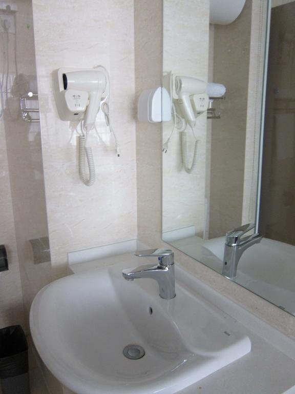 Циндао: Jinshi Apartment Hotel