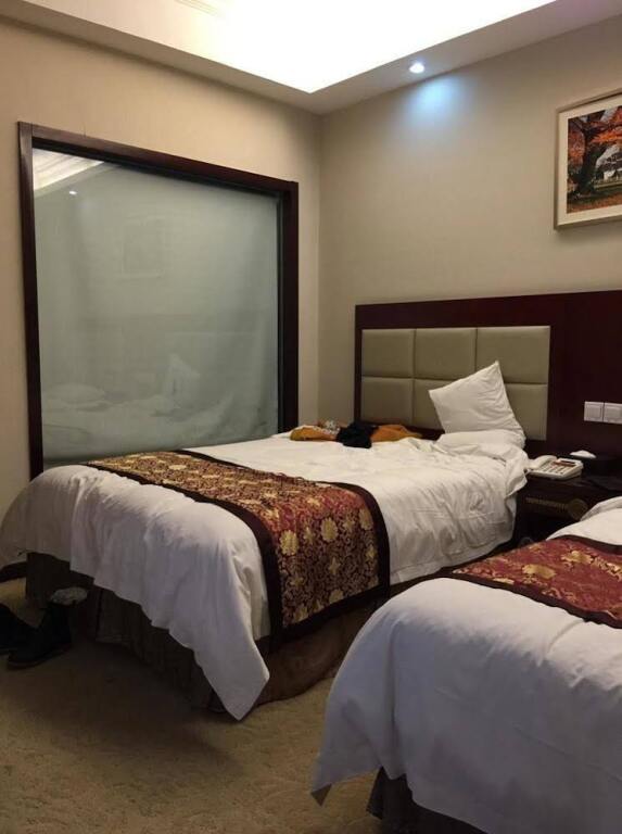 Цзясинь: Vienna International Hotel (Jiaxing College)