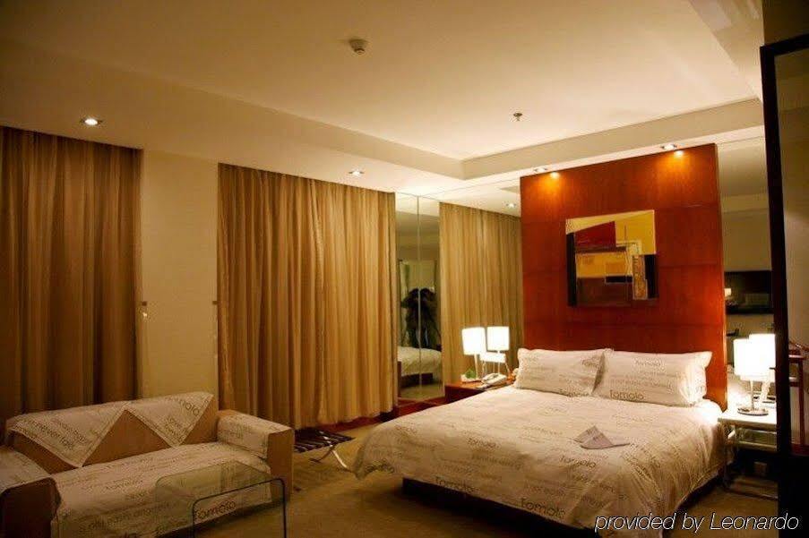 Yangtze River TOMOLO Hotel (Jianghan Road Branch) — фото 1