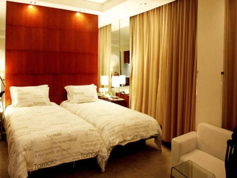 Ухань: Yangtze River TOMOLO Hotel (Jianghan Road Branch)