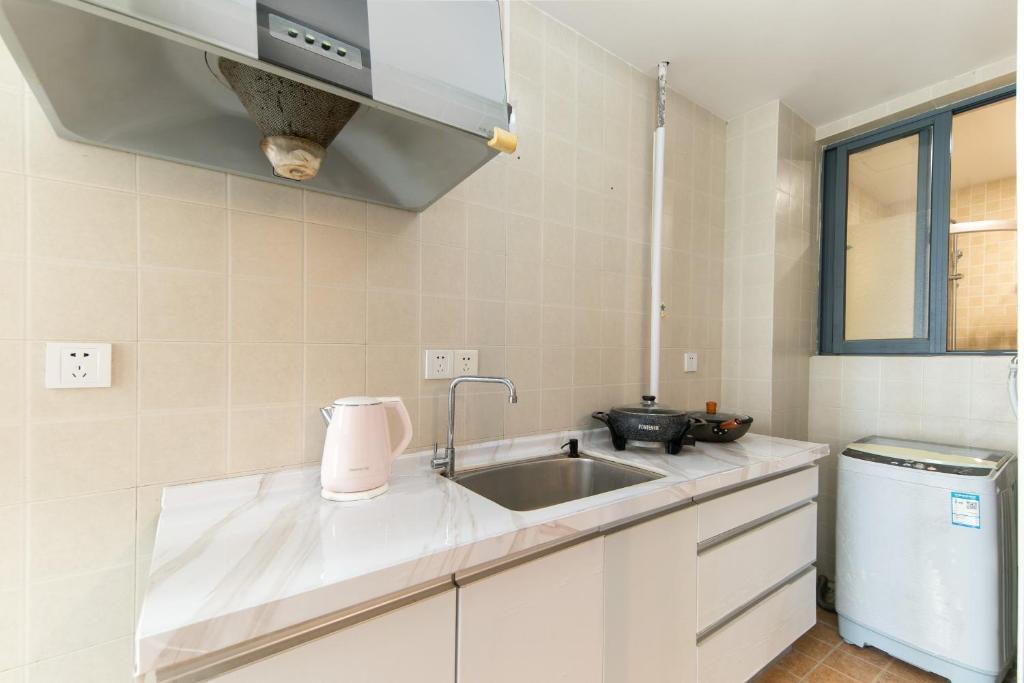 Санья: Sanya Chun Ting Apartment