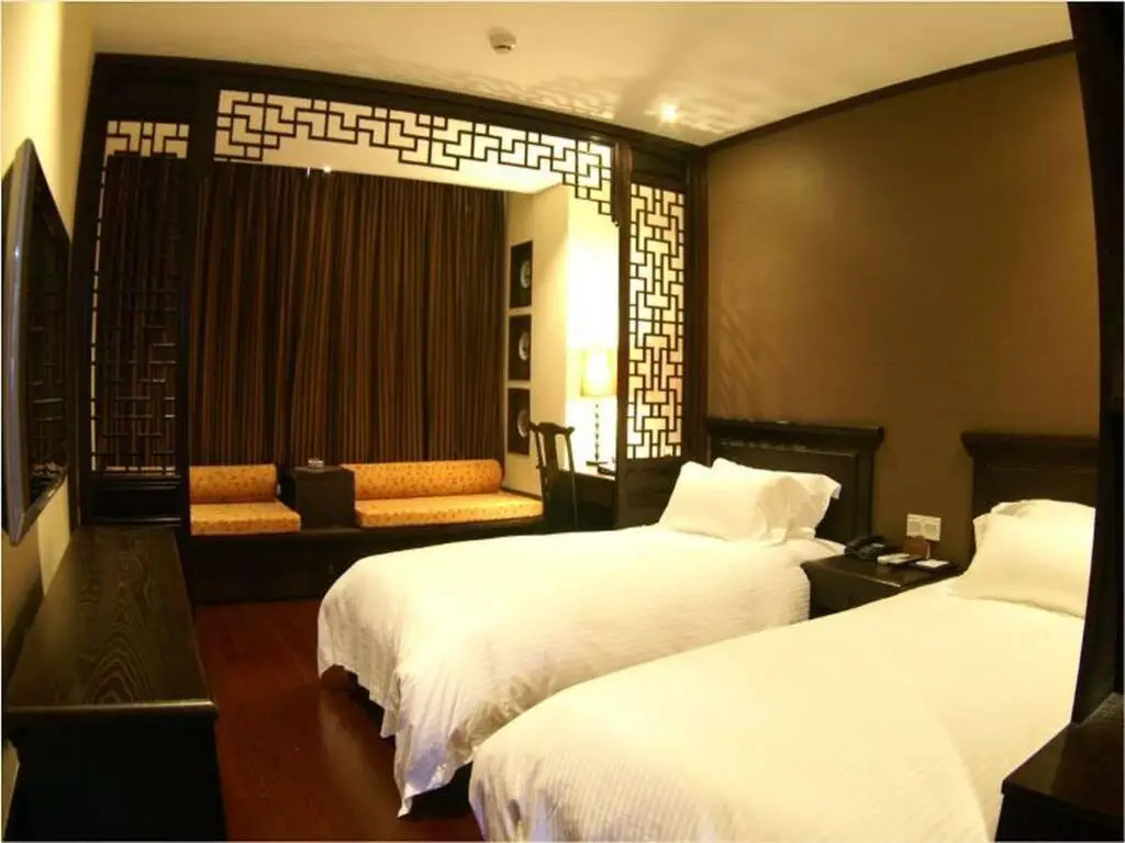 Шанхай: Baolong Homelike Hotel (Mudanjiang Branch)
