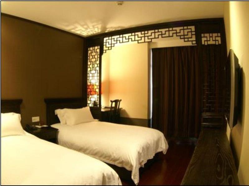 Шанхай: Baolong Homelike Hotel (Mudanjiang Branch)