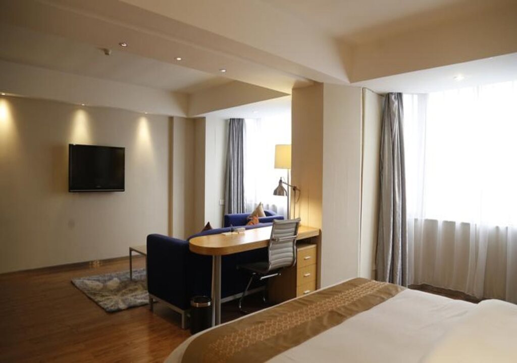 Гуанчжоу: Orange Hotel Guangzhou Quzhuang Metro Station