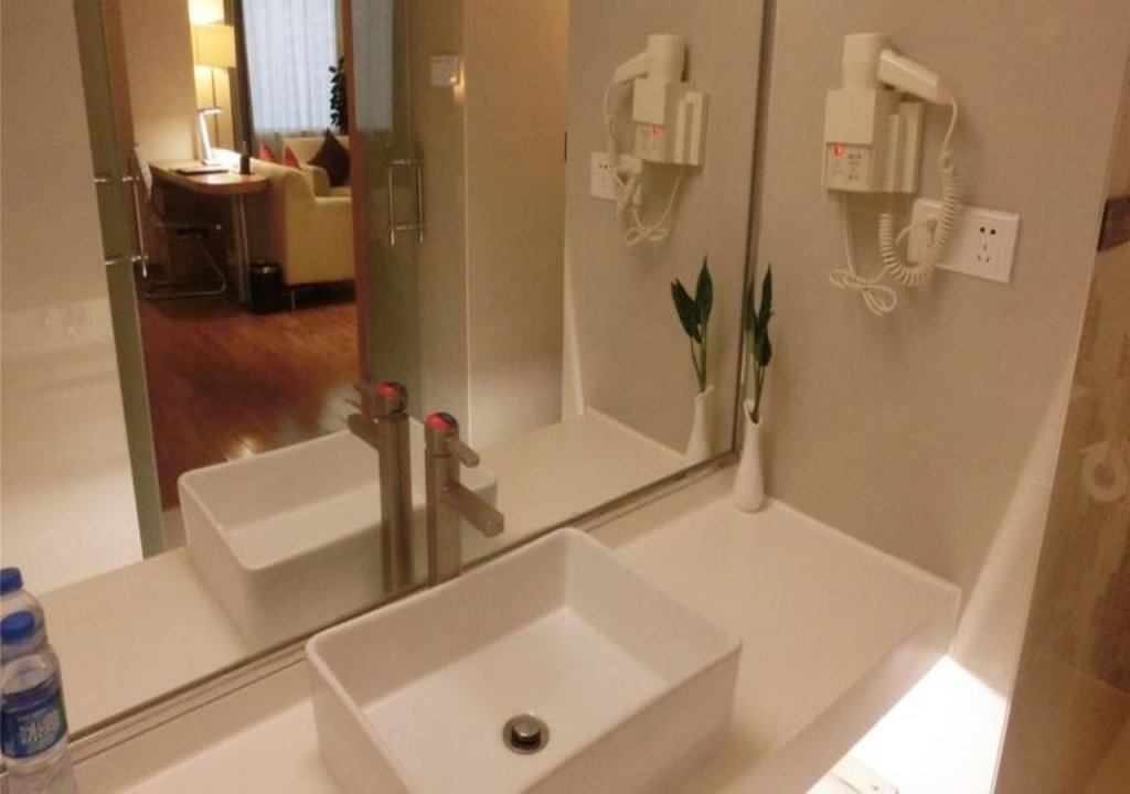 Гуанчжоу: Orange Hotel Guangzhou Quzhuang Metro Station