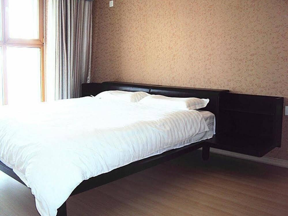 Харбин: Harbin Mykal Xinwang Apartment