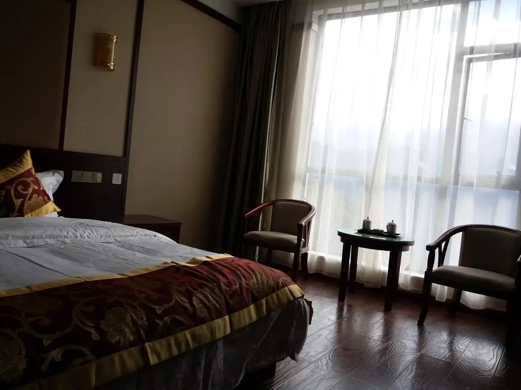 Дечен: Mingzhu Hotel