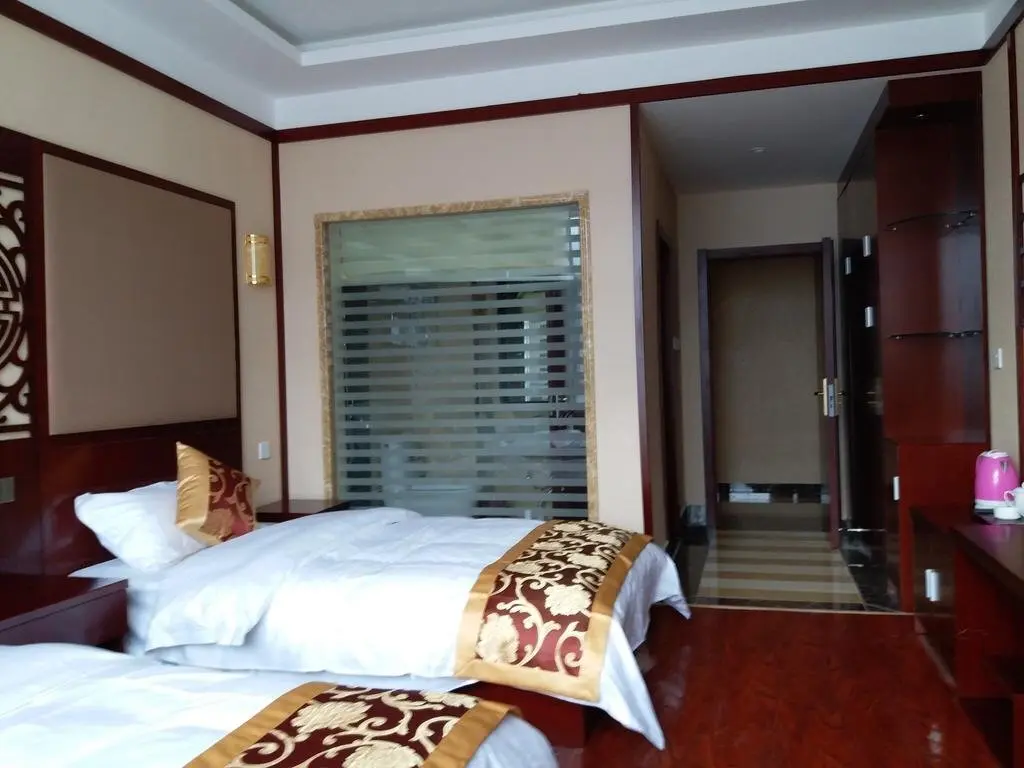 Дечен: Mingzhu Hotel
